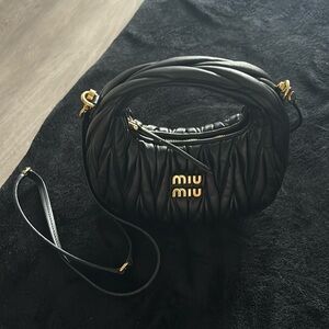 Wander matelassé nappa leather hobo mini-bag. Pristine condition. New collection